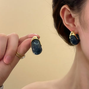 Aretes Carey
